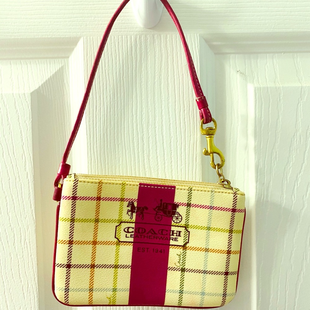Coach horse snd carriage wristlet